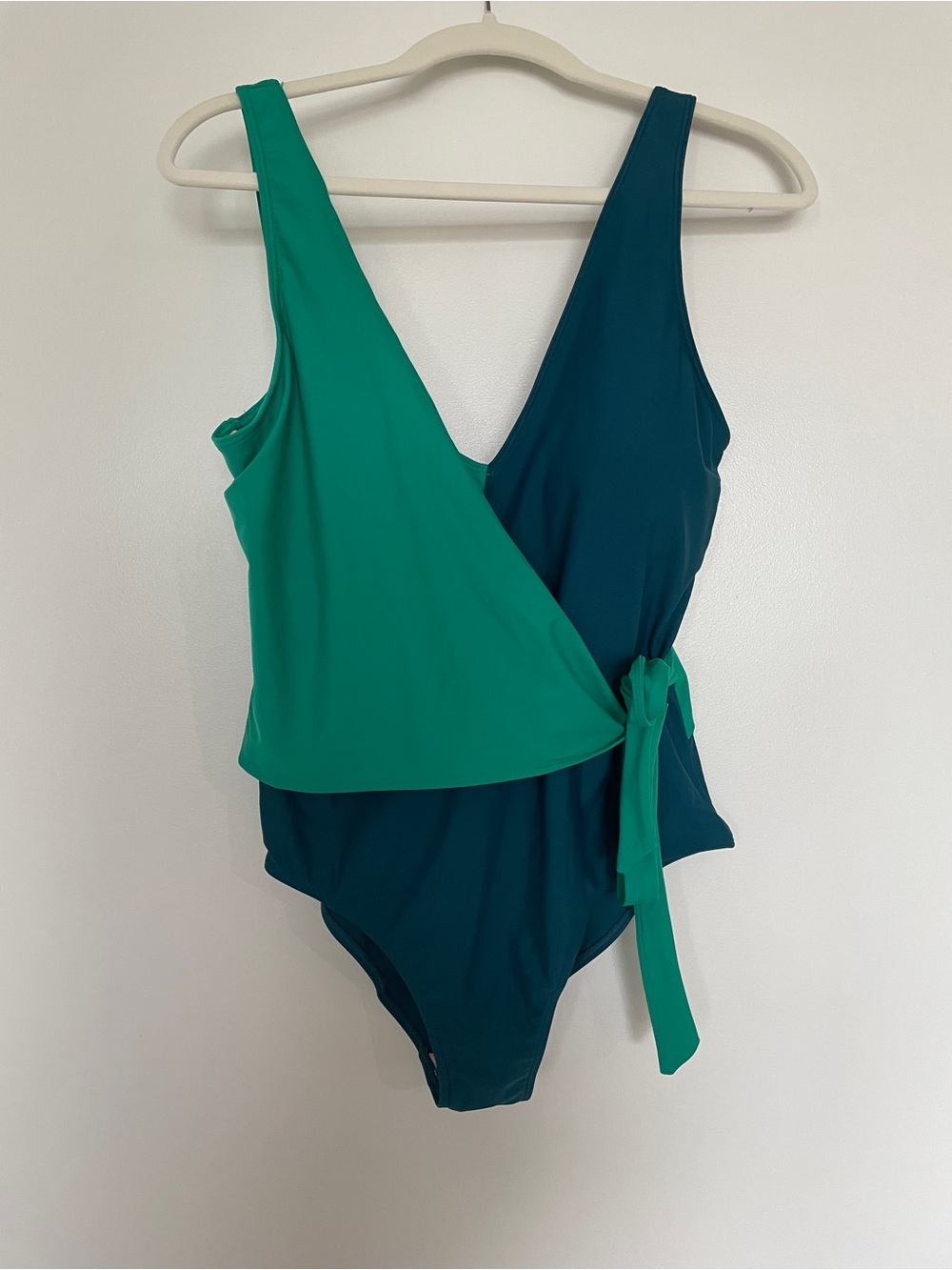 Summersalt “The Perfect Wrap” One-Piece Swimsuit in green and blue.